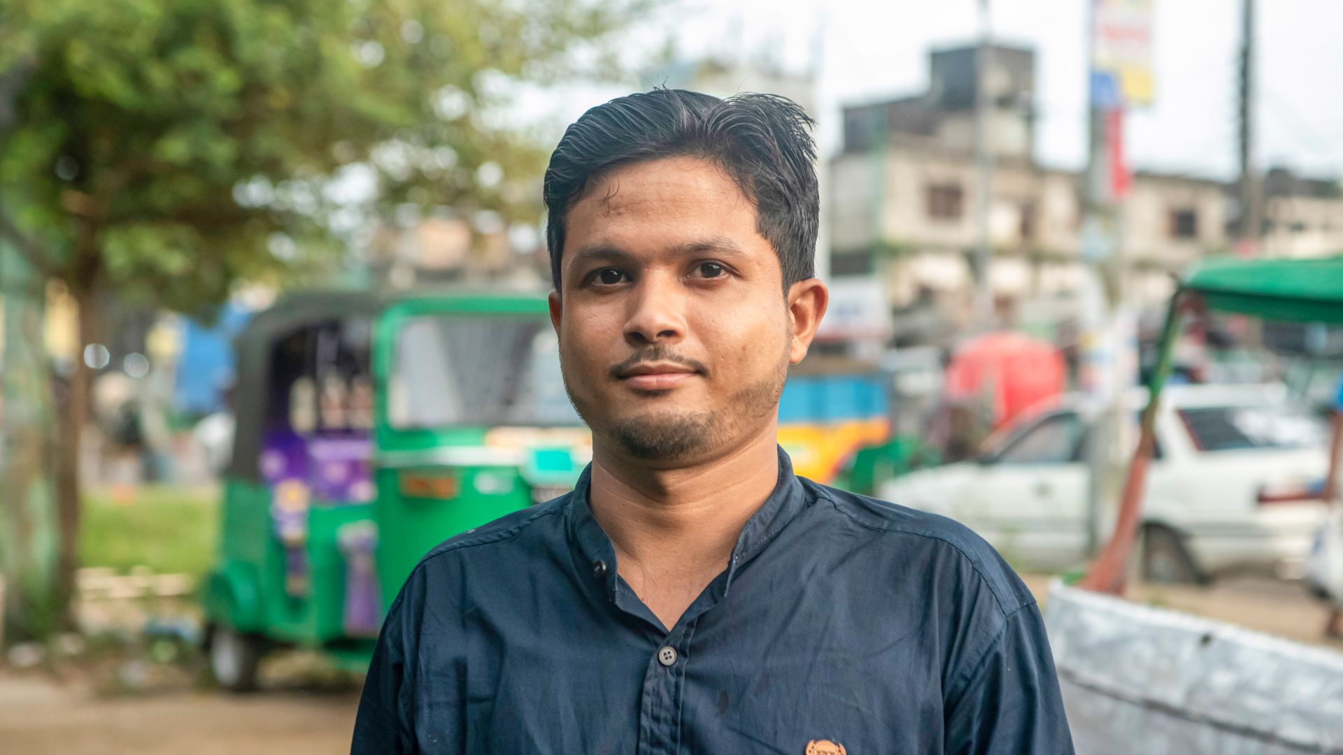 Teacher, doorstep learning, working children, Sylhet, Bangladesh